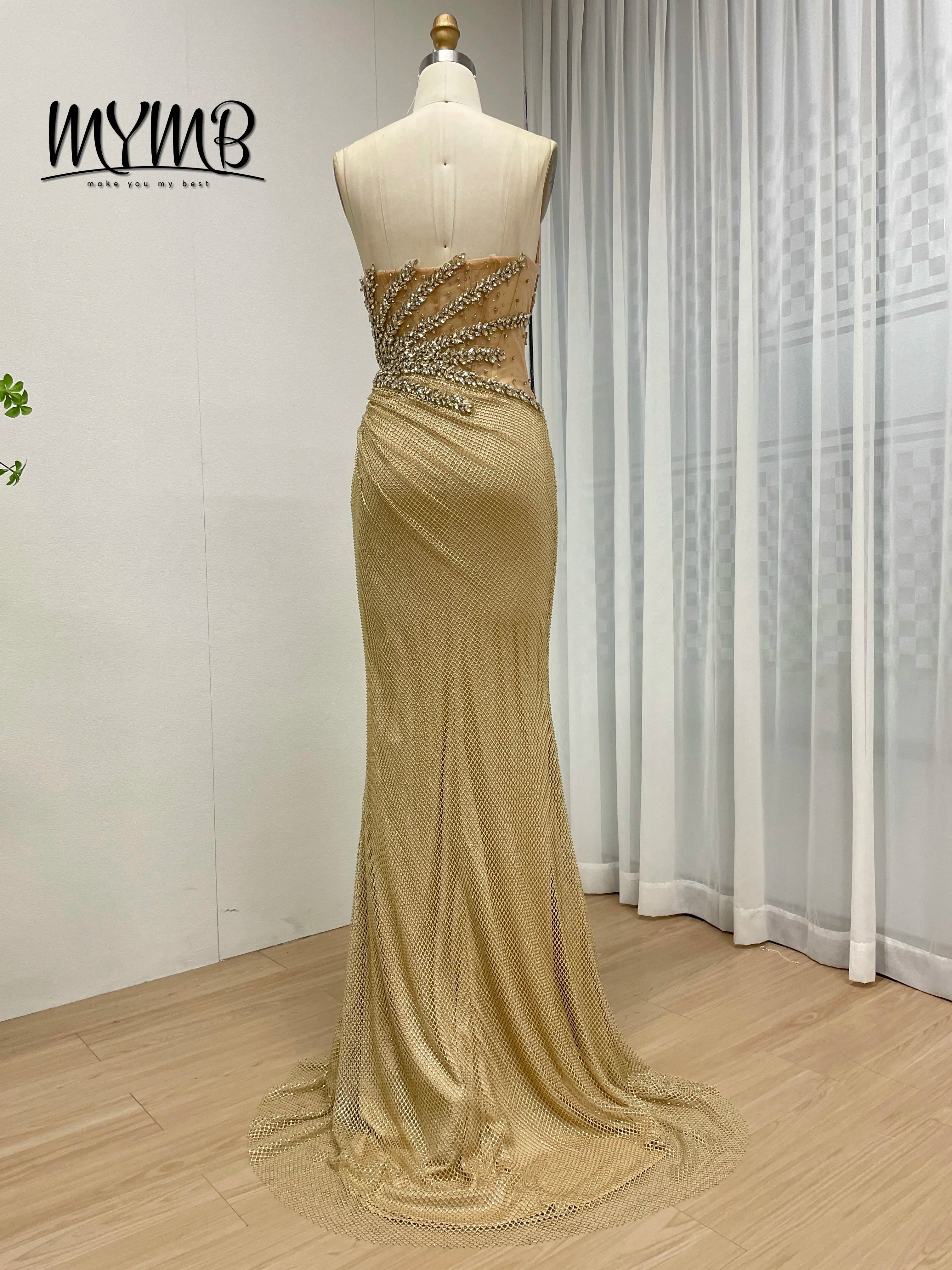 The Champagne Radiance: MYMB Dramatic Rhinestone Celebrity Gown